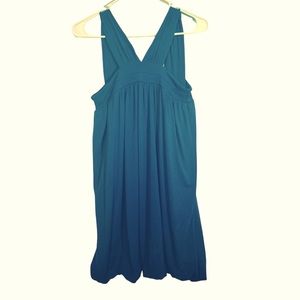 Short turquoise dress NWOT No imperfections great fit. In a smoke free home